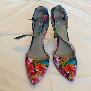 Floral ankle strap heel.